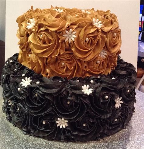 gold and black cake decorations|black and gold rosette cake.